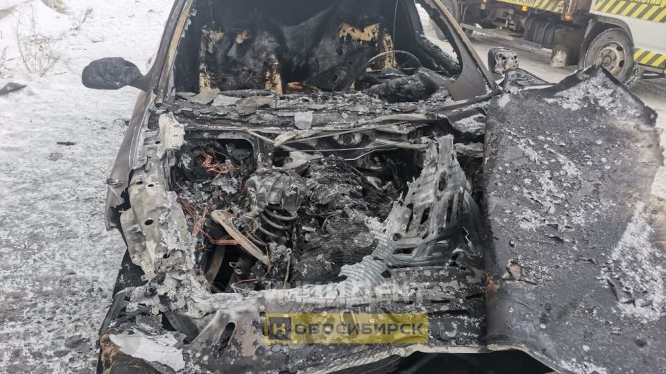 Сгоревшая BMW в Новосибирской области