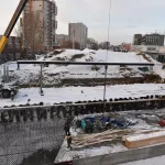 В снег и мороз: как идет реконструкция моста на проспекте Ленина в Барнауле