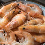 Десятки россиян отравились креветками и рыбой на курорте