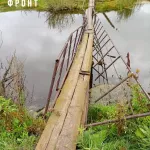 Алтайские школьники вынуждены ходить по жуткому разбитому мосту