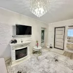 Квартиру с тремя лоджиями и панорамными окнами продают в Барнауле. Фото