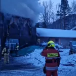 Туристическая база Юность горит в Республике Алтай