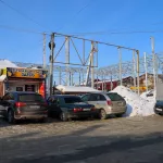 Пуля в пулю: как отстраивают Теплый рынок и что известно о причинах большого пожара. Фото