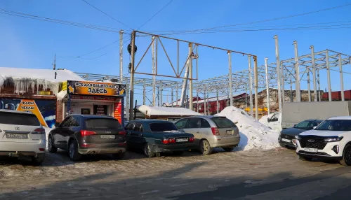 Пуля в пулю: как отстраивают Теплый рынок и что известно о причинах большого пожара. Фото