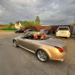 Серебристый кабриолет премиум-класса со складной крышей продают в Бийске. Фото