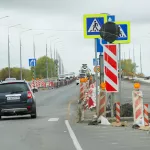 Осень, плиты, одеяла на склонах: как в Барнауле ремонтируют федеральный мост. Фото