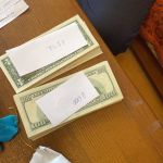 Пачки денег: появились фото взятки главы алтайского минздрава